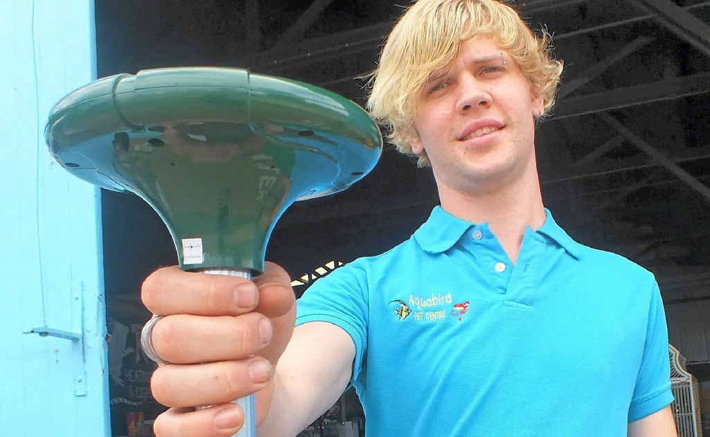 Aquabird employee Dan Hall with a snake-repelling product. 